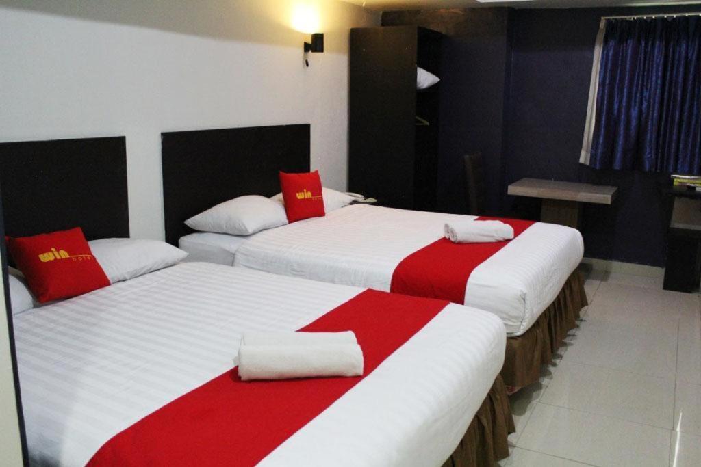 Win Hotel *
